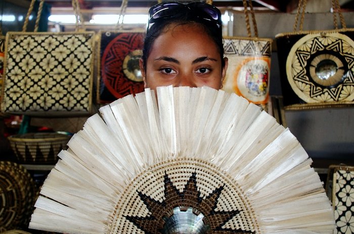 Person holding up handmade fan